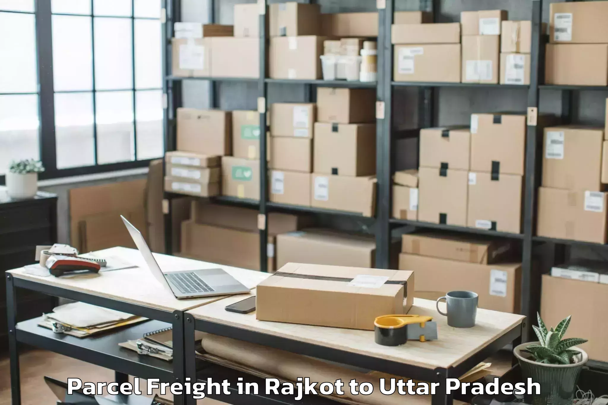 Book Rajkot to Jhusi Parcel Freight Online